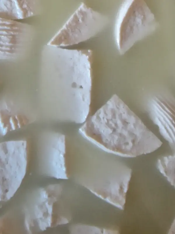 Pieces of chalitzia, the traditional goat cheese of Tilliria