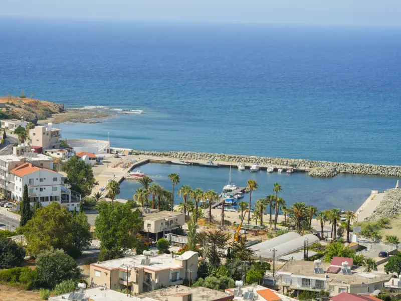 Kato Pyrgos village, harbour and palm trees by the sea